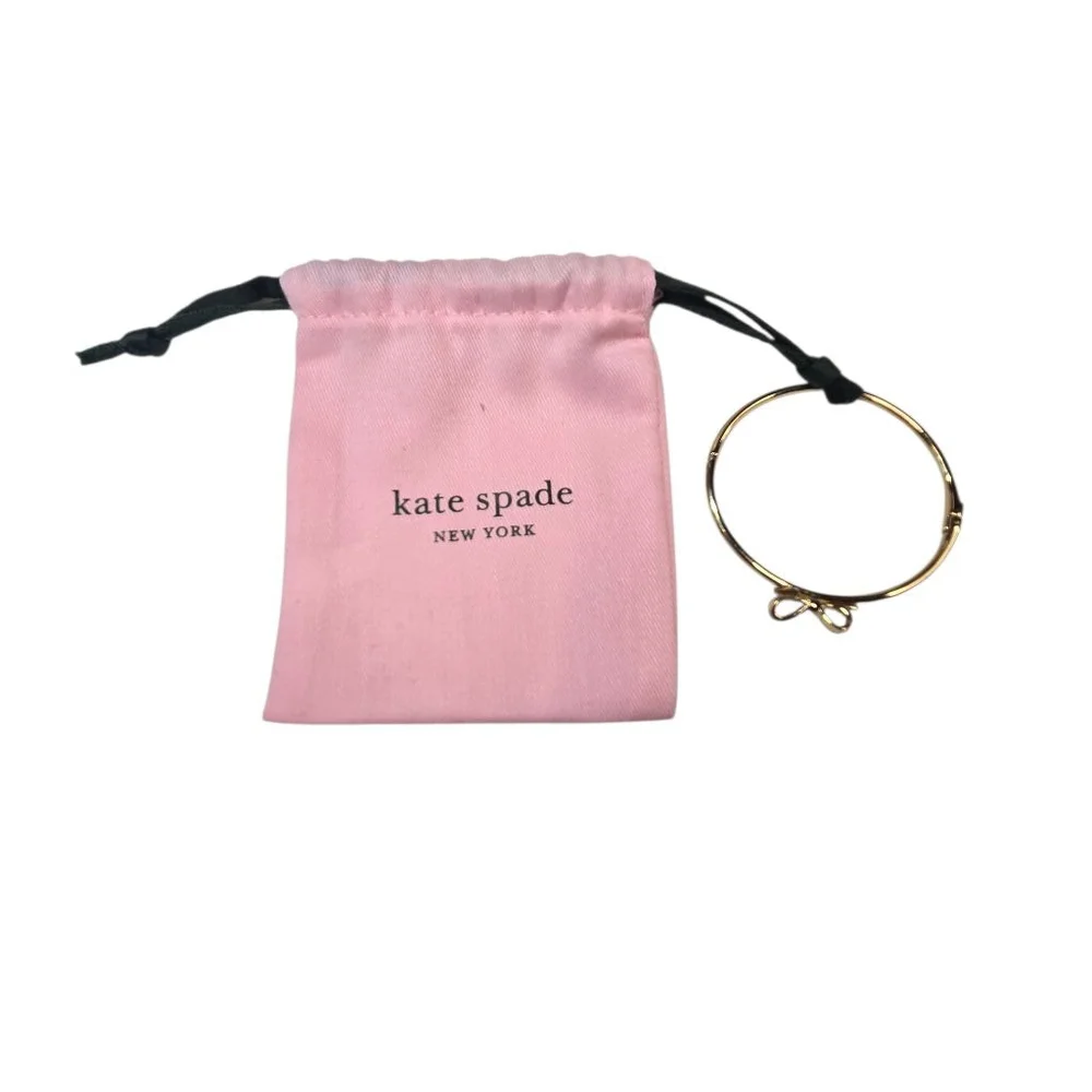 Kate Spade Goldtone NY Ribbon Bow Bangle Bracelet Size 7 Foldover Clasp Dustbag